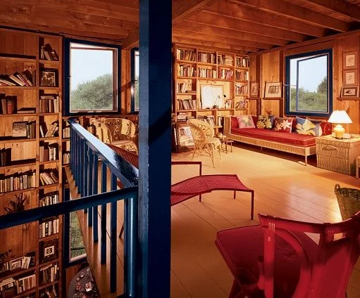 This image may contain Furniture Chair Building Housing Hotel Wood Resort House and Indoors