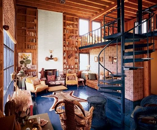 This image may contain Housing Building Indoors Loft Living Room Room and Furniture