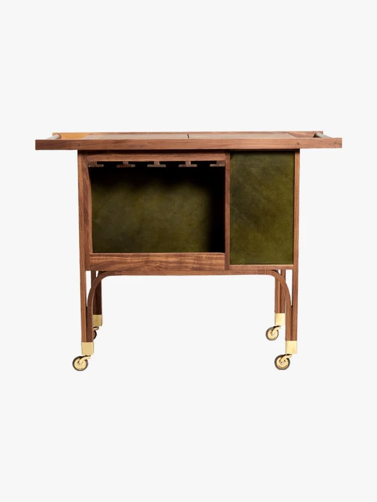 Image may contain: Furniture, Table, Desk, Sideboard, Computer, Electronics, and Blackboard