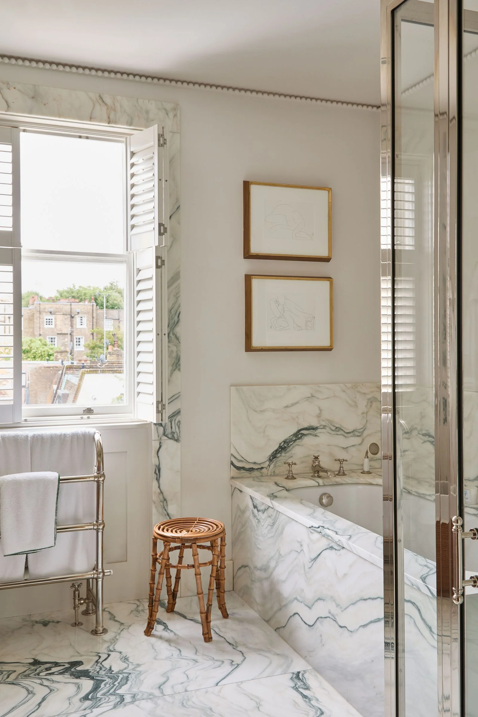Image may contain Indoors Interior Design Bathing Bathtub Person Tub Sink Sink Faucet Art and Painting