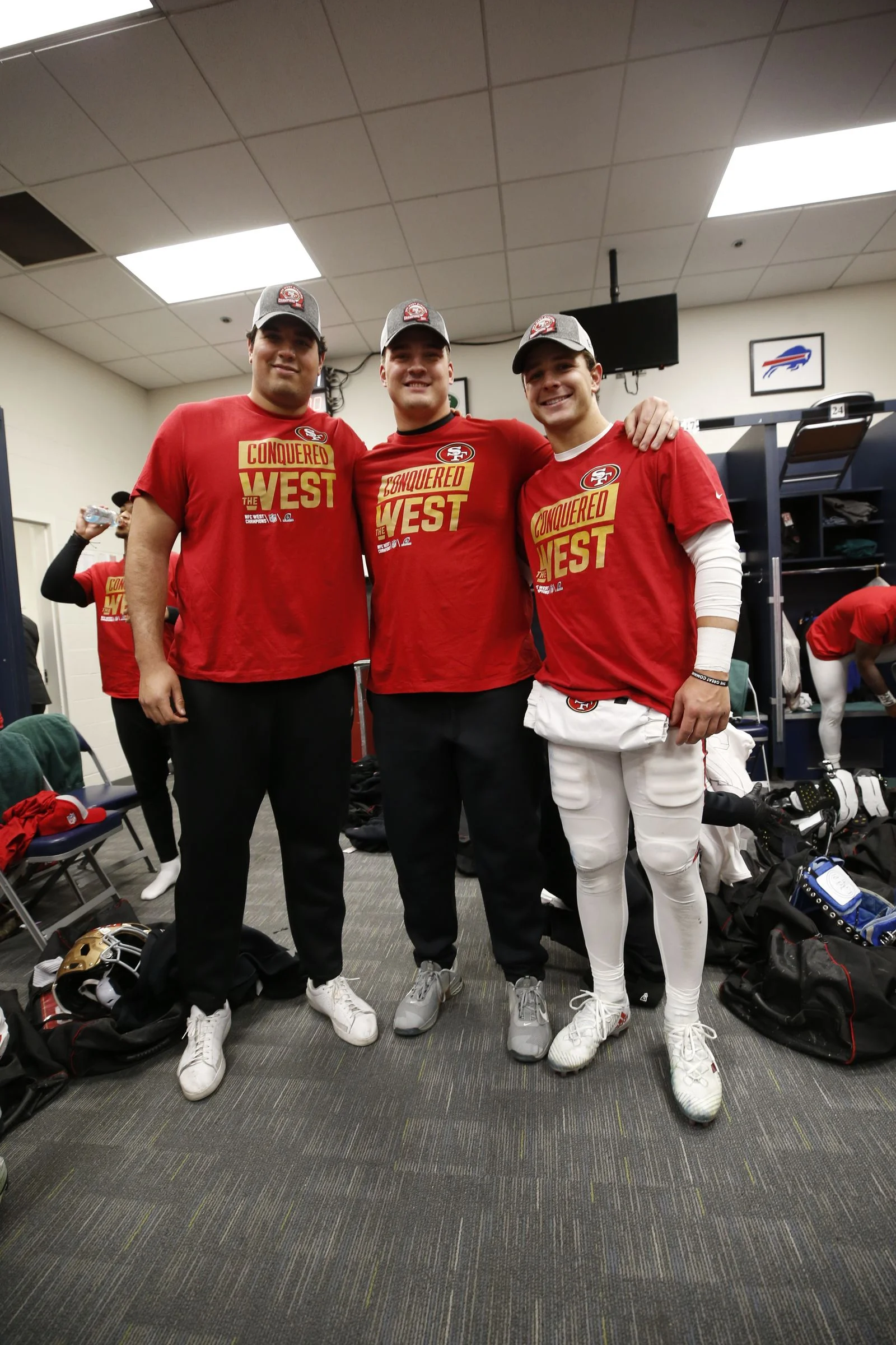 Image may contain Jack Conklin Clothing TShirt Footwear Shoe People Person Pants Sneaker Baseball Cap and Cap